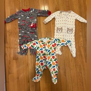 Three baby footie pajama onesies